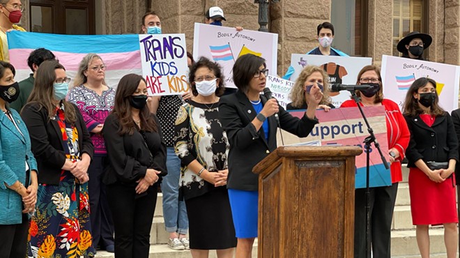 LGBTQ+ advocates speak out against bills targeting transgender children during an earlier rally at the Texas Capitol.