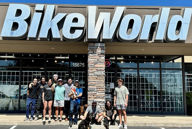 Bike World employees stand in front of the chain's U.S. Highway 281 location prior to its July 10 closure. - Facebook / Bike World