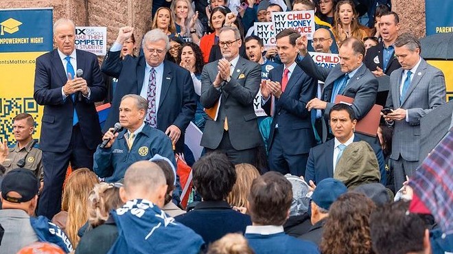 Gov. Greg Abbott speaks at a pro-voucher event held last month at the Texas Capitol.