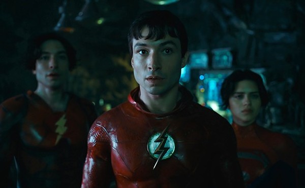 Ezra Miller stars as lightning-fast hero the Flash.