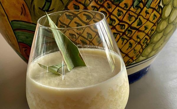 This serving piña colada flaunts its tropical flavors.