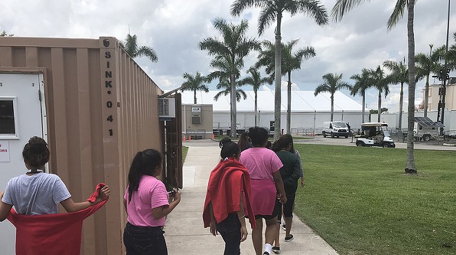 Unaccompanied minors photographed at a Homestead, Florida, run by HHS.