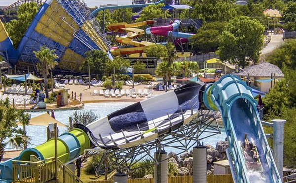 Hurricane Harbor at Six Flags Fiesta Texas
17000 W I-10, (210) 697-5050, sixflags.com/fiestatexas
For double the fun, you’ll thank yourself for hitting up Fiesta Texas. Have your fun on the regular coasters at night when it’s slightly cooler, but first beat the heat at the newly rebranded Hurricane Harbor. There’s a variety of water rides and attractions, which capture all different vibes, from competitive to tranquil, under the sun. Of course, you can’t forget about the Texas-shaped wave pool, nicknamed the Lone Star Lagoon, or the classic, funnel-shaped Tornado thrill ride.