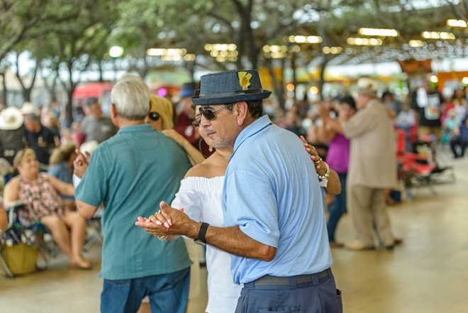 Dancers move to the music at a past Tejano Conjunto Festival. - Jaime Monzon