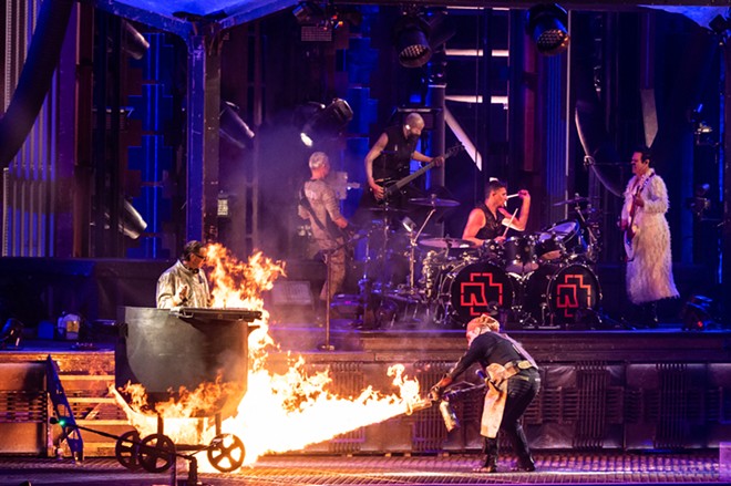 Rammstein's frontman "cooks" the band's keyboard player in a pot during the show. - Jaime Monzon