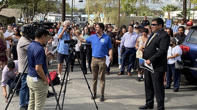 Councilman Mario Bravo speaks to District 1 residents, business owners and workers during a contentious meeting last year on the St. Mary’s Strip.