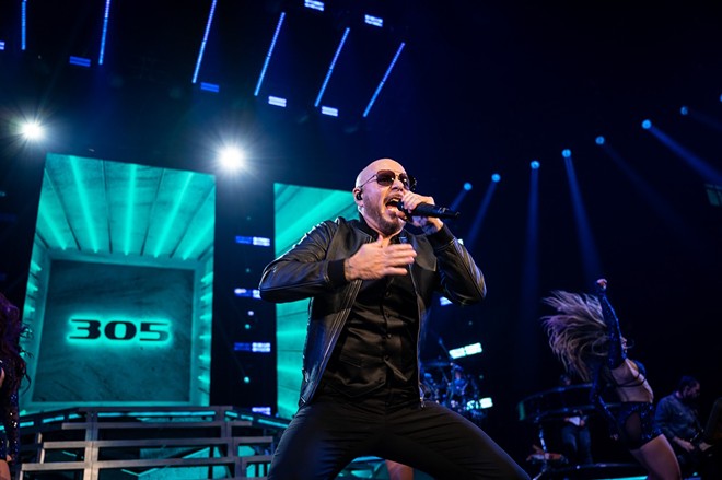 Cuban rapper Pitbull performs at San Antonio's AT&T Center in September 2022. - Jaime Monzon