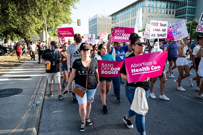 People march for abortion rights in the streets of downtown San Antonio last year. - Jaime Monzon