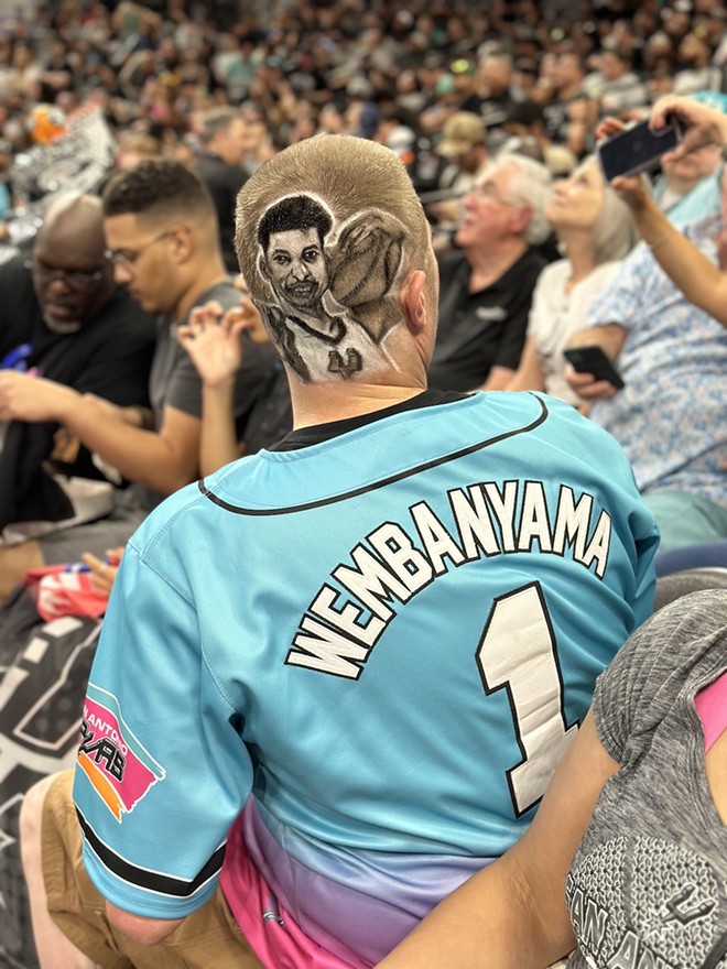 Spurs fan Mark Burnett shows off his Wemby haircut. - Michael Karlis