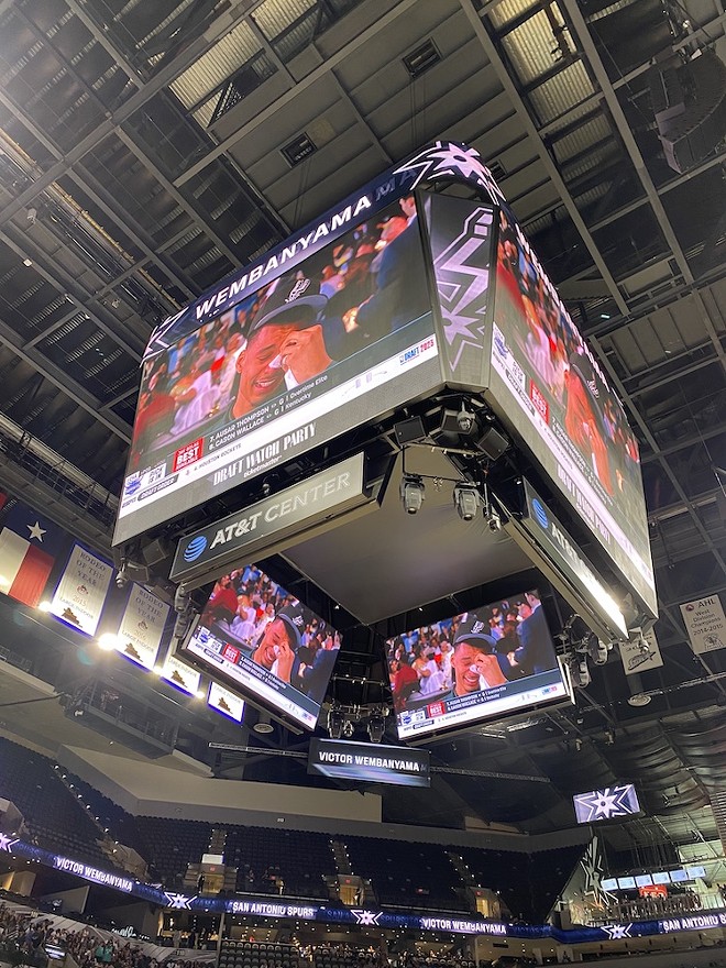 The Jumbotron shows Wemby weeping tears of joy as he's drafted by the Spurs. - Michael Karlis