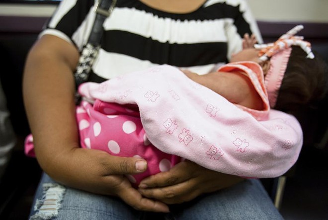 Patients wait to be seen at the People’s Community Clinic in Austin in 2014. The clinic provides state-subsidized women’s health services to low-income people. - Texas Tribune / Callie Richmond