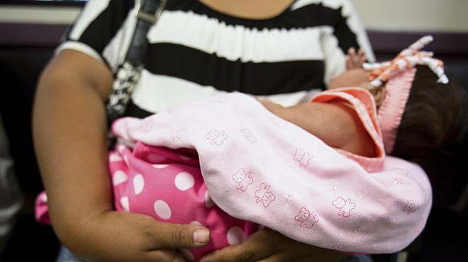 Patients wait to be seen at the People’s Community Clinic in Austin in 2014. The clinic provides state-subsidized women’s health services to low-income people.