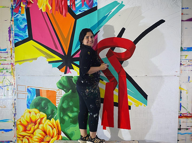 Artist Sandra Gonzalez works on a painting. - Courtesy Photo / City of San Antonio Department of Arts & Culture